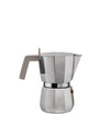 Silver metallic moka pot by Alessi with a light grey handle and octagonal design.