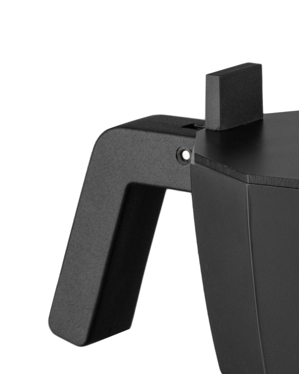 Black moka pot by Alessi with a matte finish, octagonal body, and sturdy handle, cropped side view.