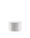 White round lidded container by Alessi, with a sleek, minimalist design.