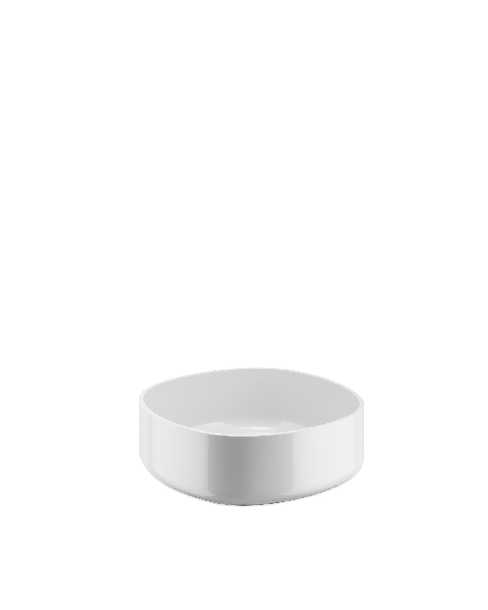 White shallow bowl by Alessi with a sleek, minimalist design, shown from a slightly elevated view.