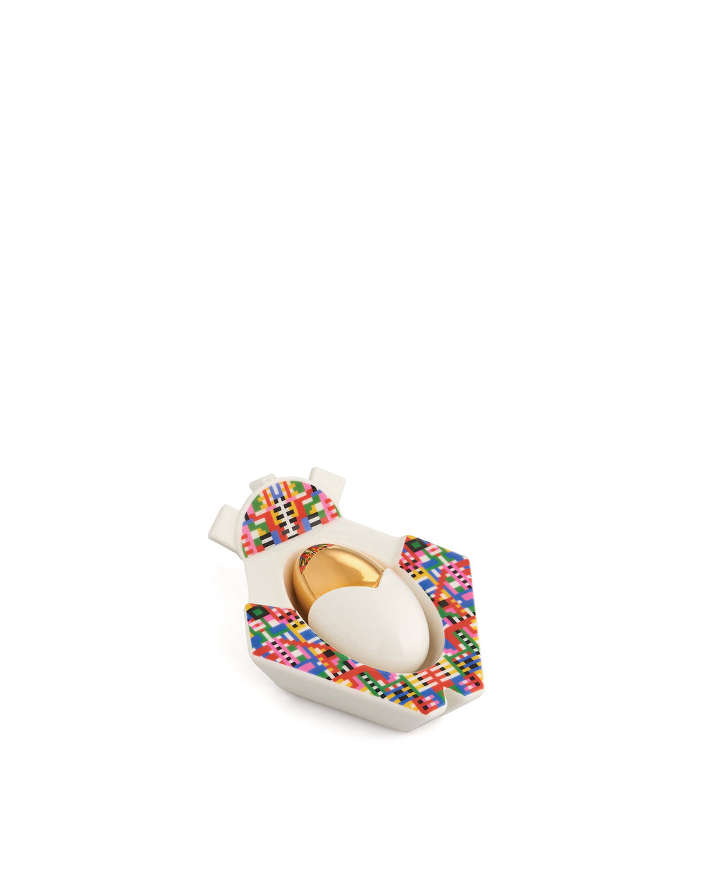White and gold Jesus ornament by Alessi with a multicolor geometric pattern.