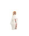 White faceted Mary statuette by Alessi with a gold halo and colorful pixelated patterns.