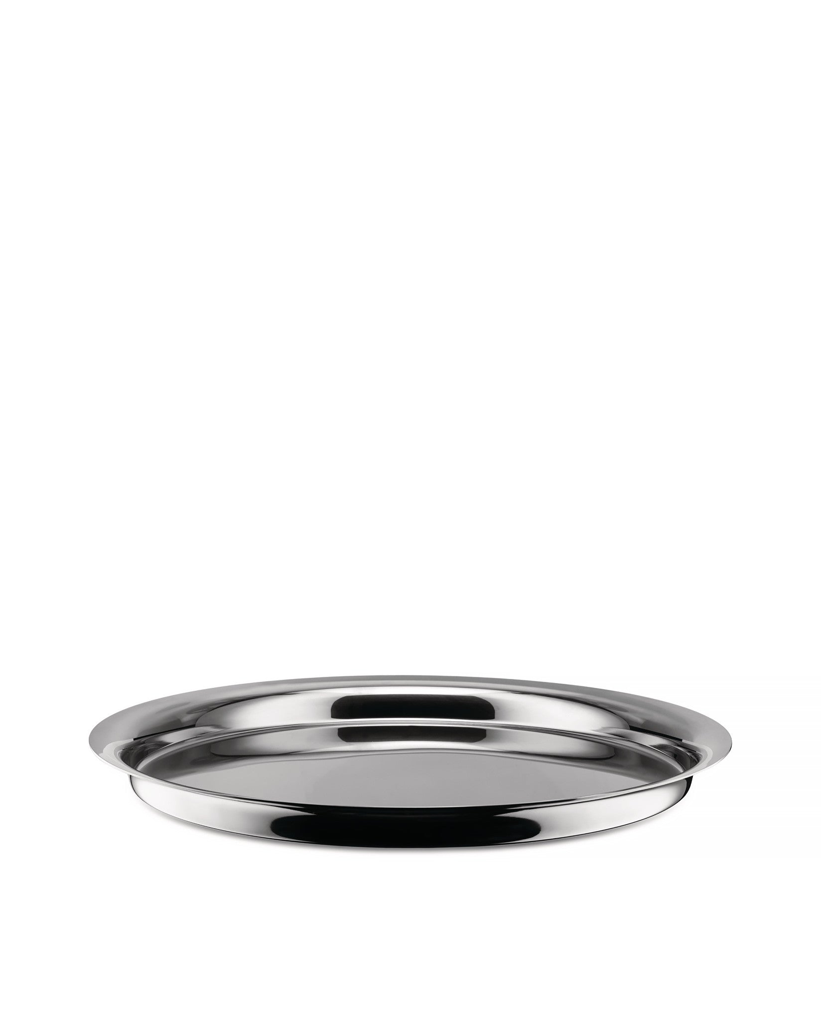 Polished round stainless steel tray by Alessi, with a highly reflective surface, shown from a low angle.