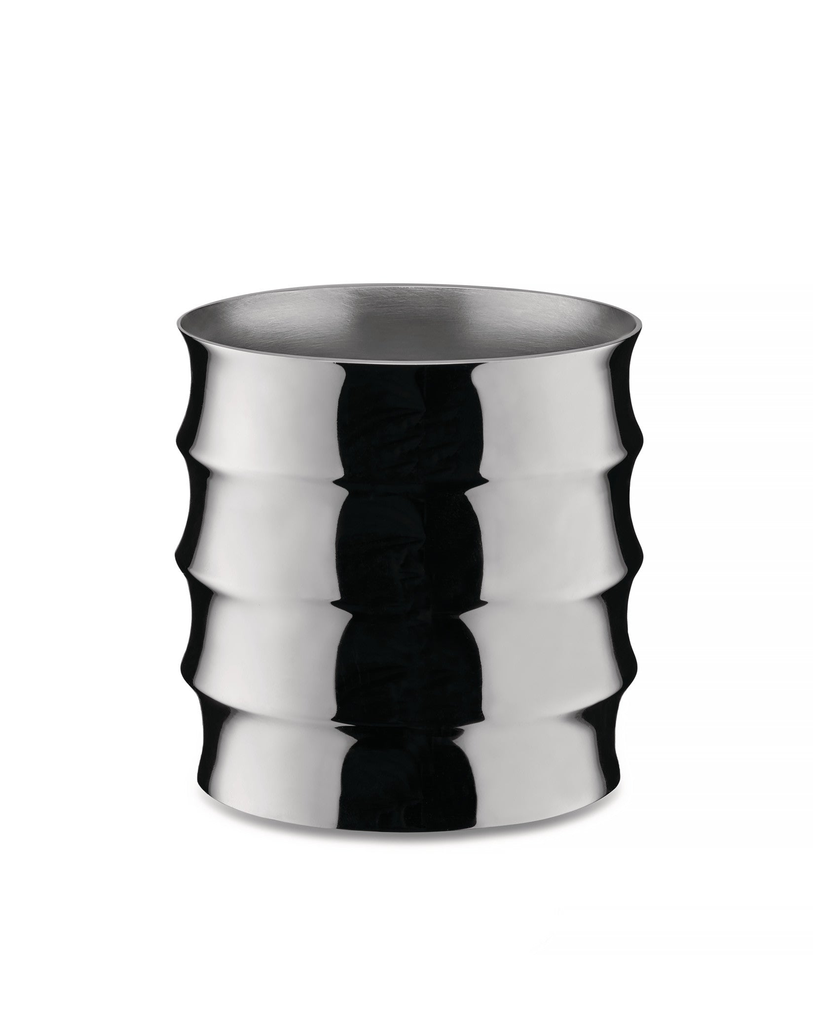 Silver metal glass by Alessi with a wavy ribbed exterior.