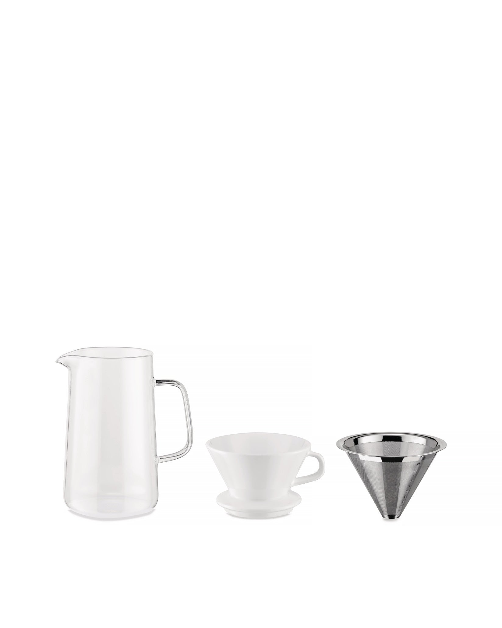 Pour-over coffee brewing set by Alessi, with a clear glass carafe, white ceramic dripper, and stainless steel filter.