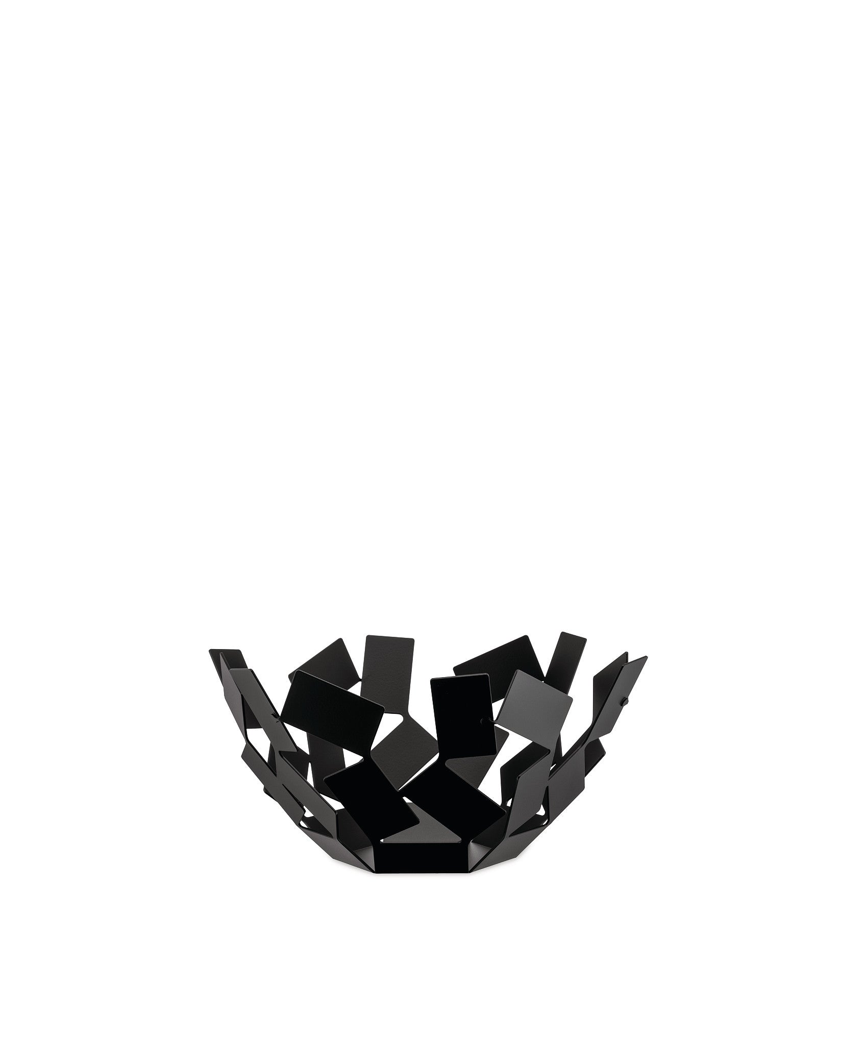 Black metal decorative bowl by Alessi, composed of scattered geometric fragments on a white background.