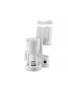 White modern coffee maker by Alessi in an exploded view, showcasing ribbed parts, a glass carafe, and a digital clock display.