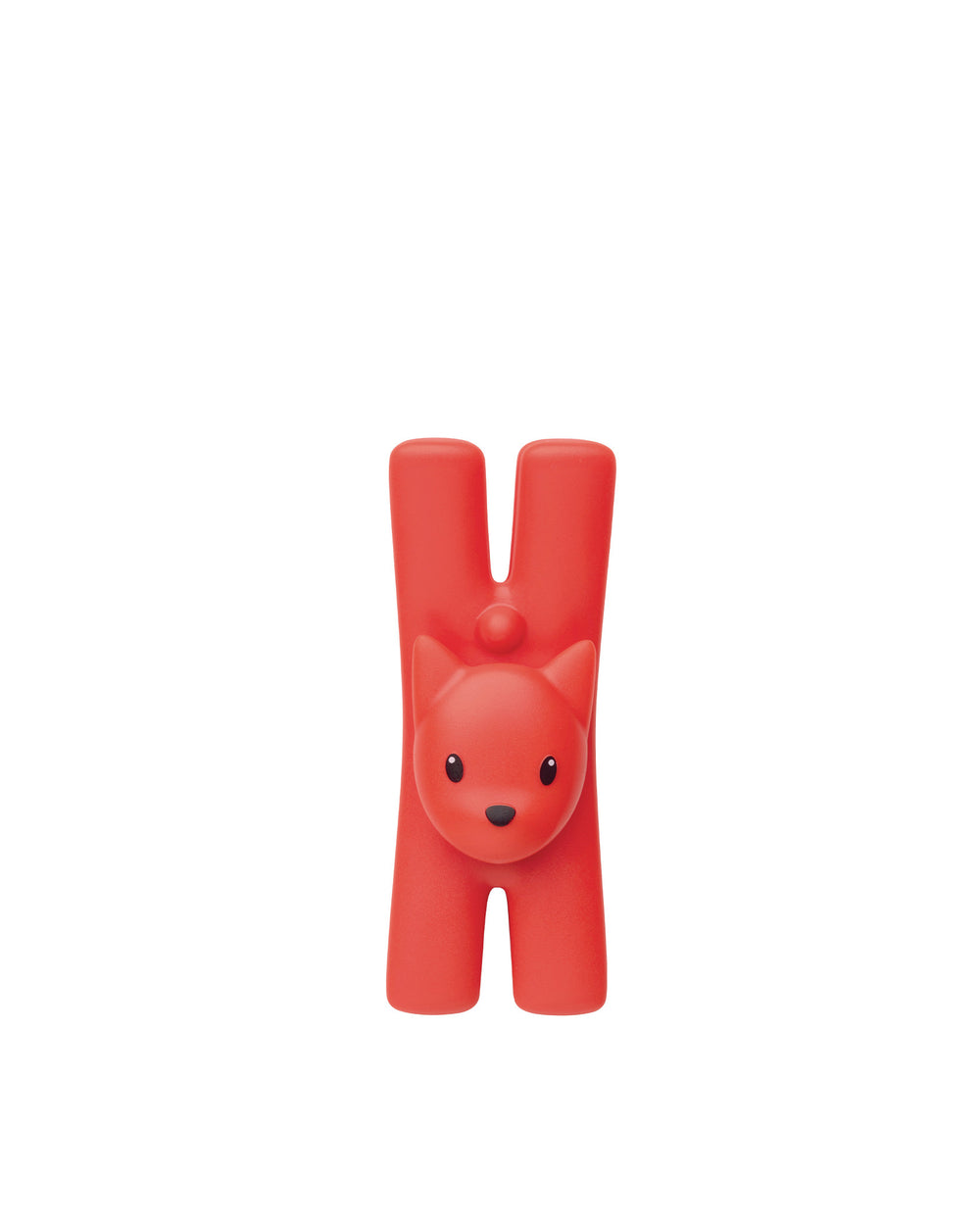 Red H-shaped decorative object by Alessi, featuring a stylized fox face with black eyes and nose.