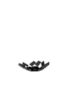 Black metal fruit bowl by Alessi, featuring an open, geometric design made from angular panels.