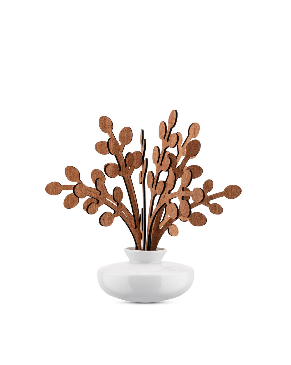 White ceramic diffuser by Alessi with intricate brown wooden leaf-shaped reeds.
