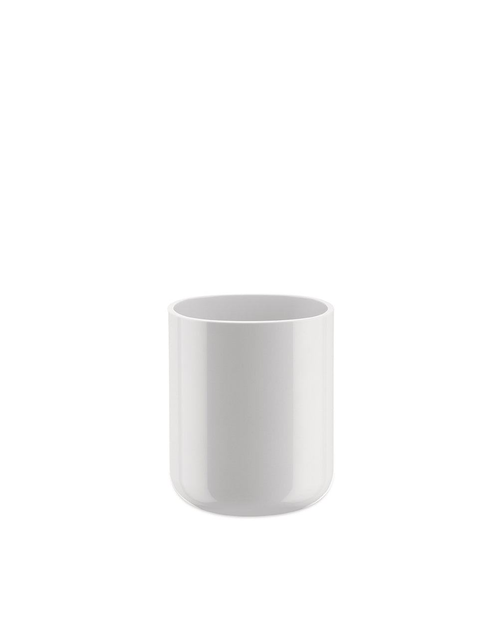 White cylindrical holder by Alessi, smooth with a minimalist design and rounded base.