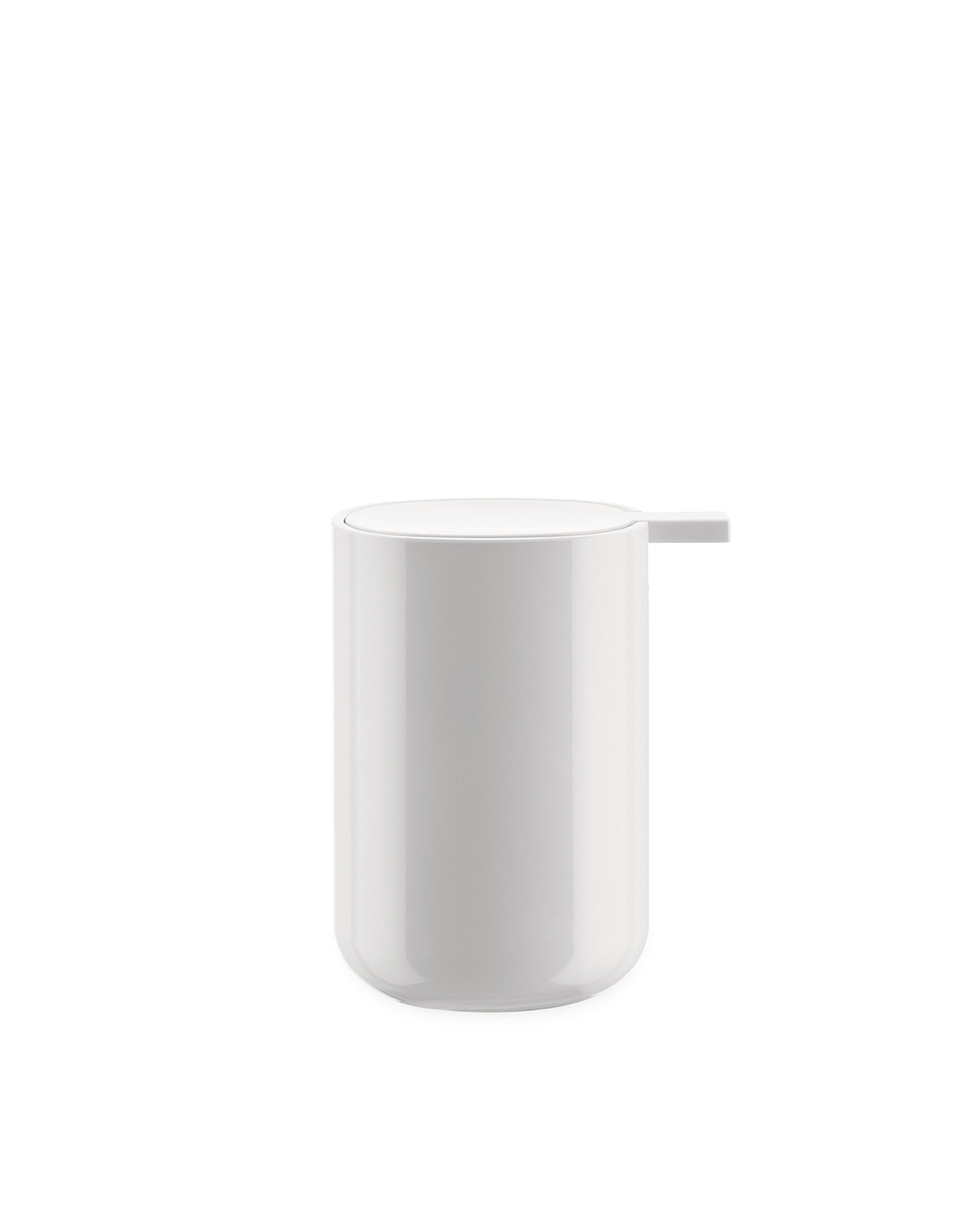 White glossy cylindrical liquid soap dispenser by Alessi, with a flat top and small rectangular tab.