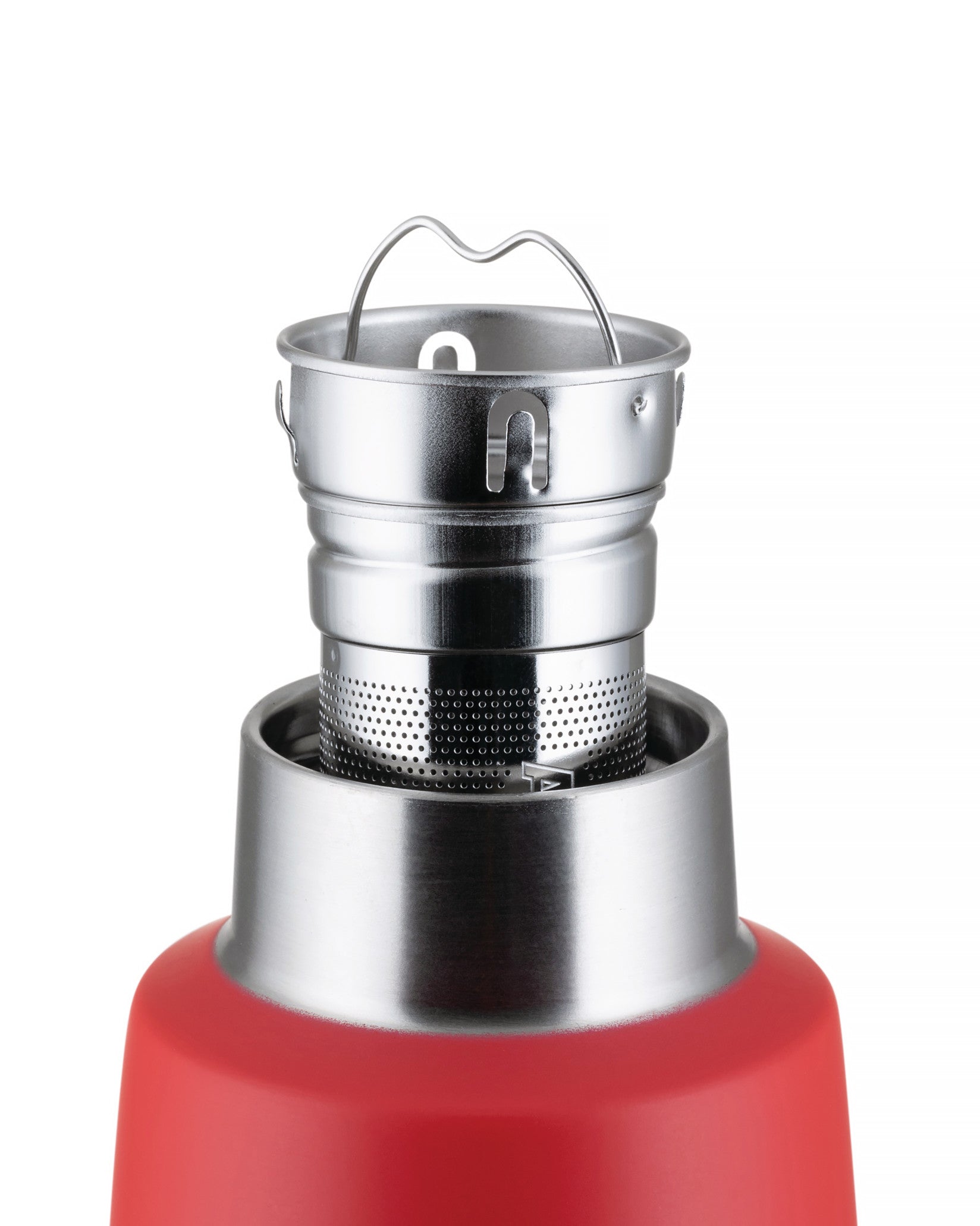 Cropped view of a red food flask by Alessi with a silver metal top featuring a perforated strainer and wire handle.