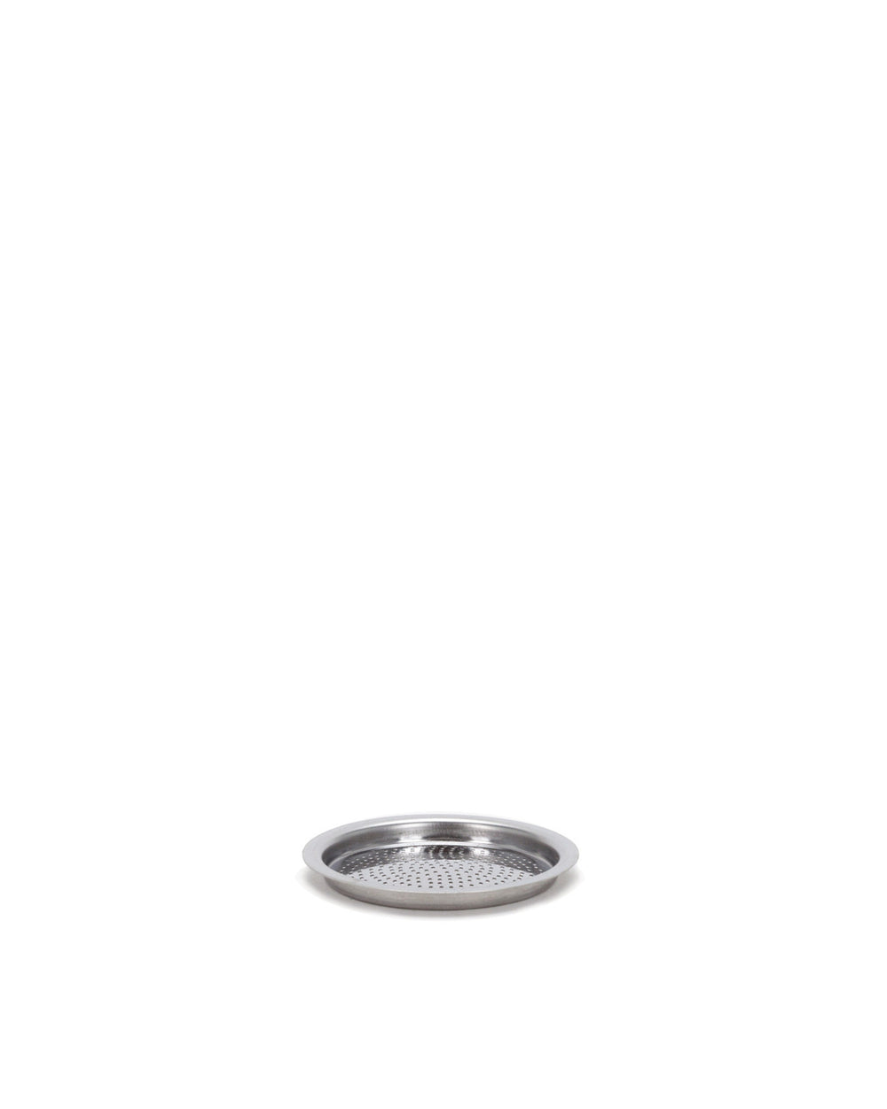 Perforated silver metal spare part by Alessi, with a raised rim and small holes, angled view.
