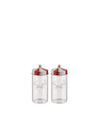 Two clear glass jars with red and white striped lids by Alessi, featuring a gold knob and carousel horse etching.