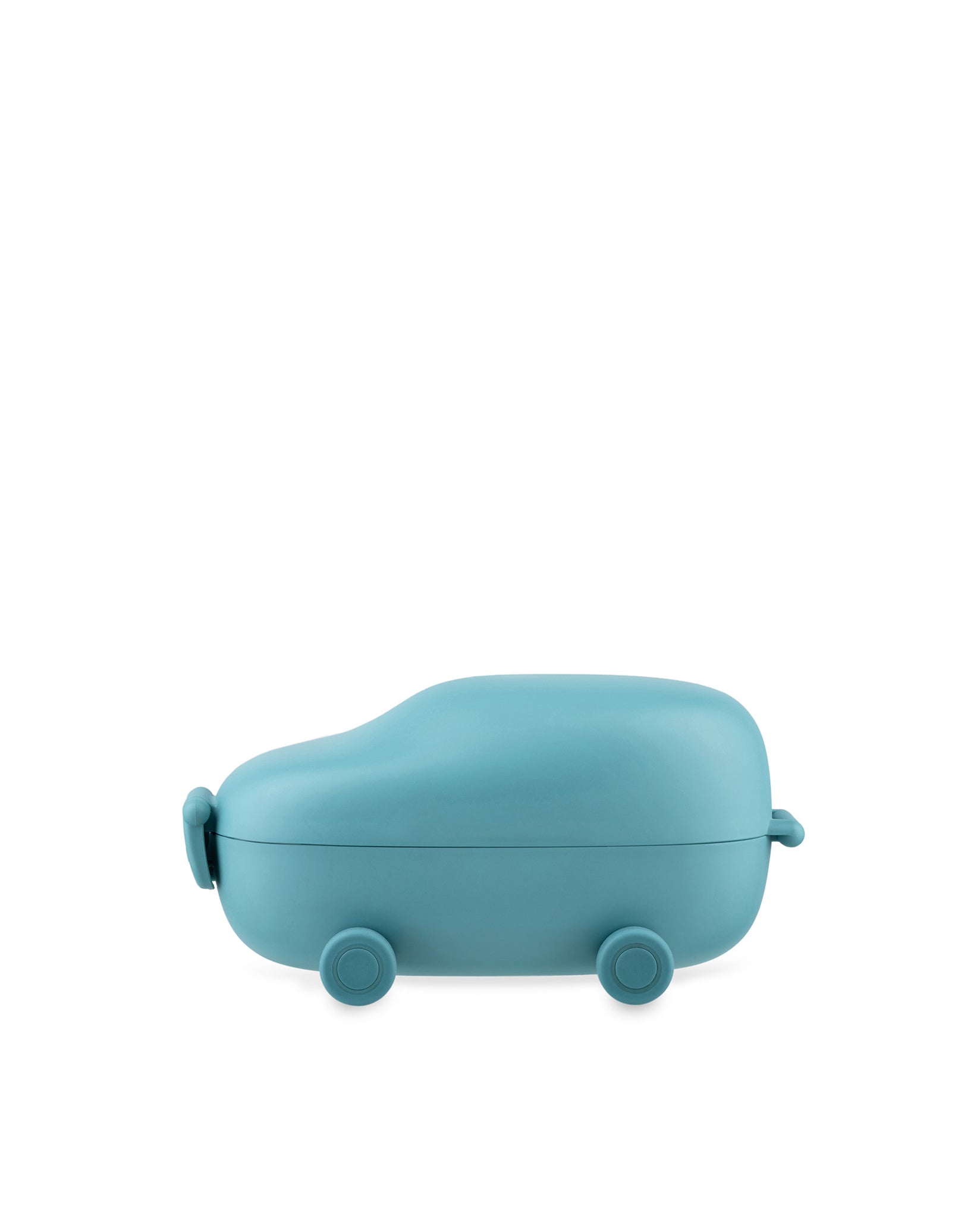 Teal rounded car-shaped food container by Alessi with small wheels.