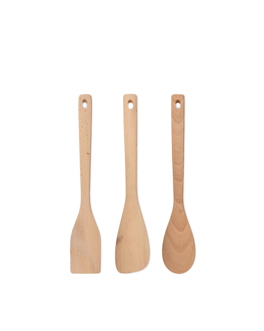 Set of three natural wood kitchen tools by Alessi, including two spatulas and a spoon with hanging holes.
