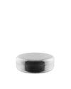 Round silver metal container by Alessi, featuring a distinctive dimpled texture.