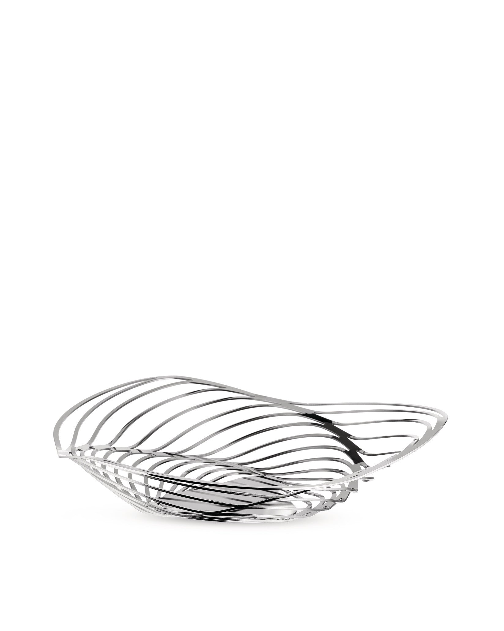 Silver metal fruit bowl by Alessi with a modern, sculptural wavy design, viewed from the side.