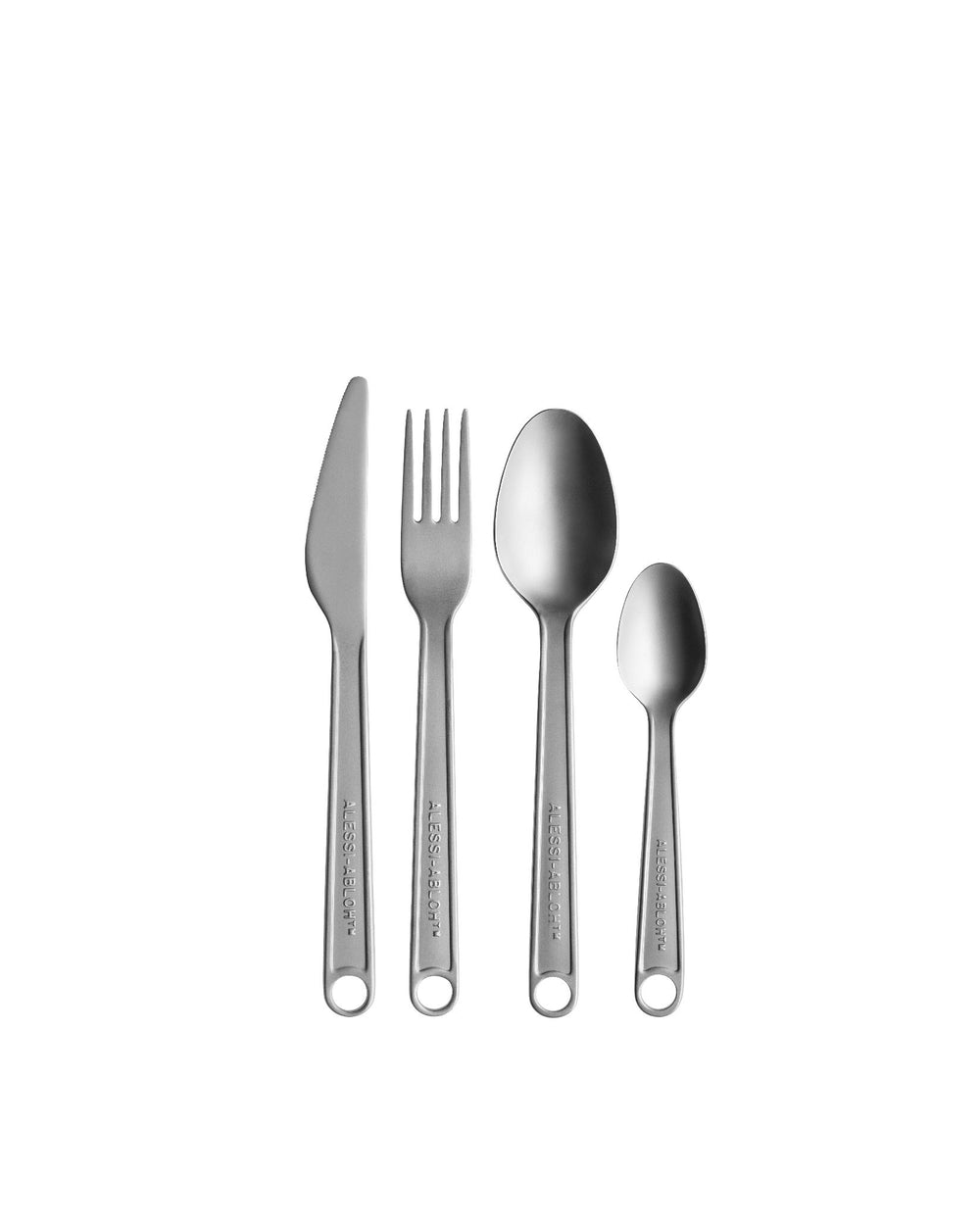 A four-piece brushed silver metal cutlery set by Alessi, featuring engraved "ALESSI-ABLOH™" handles with a ring detail.