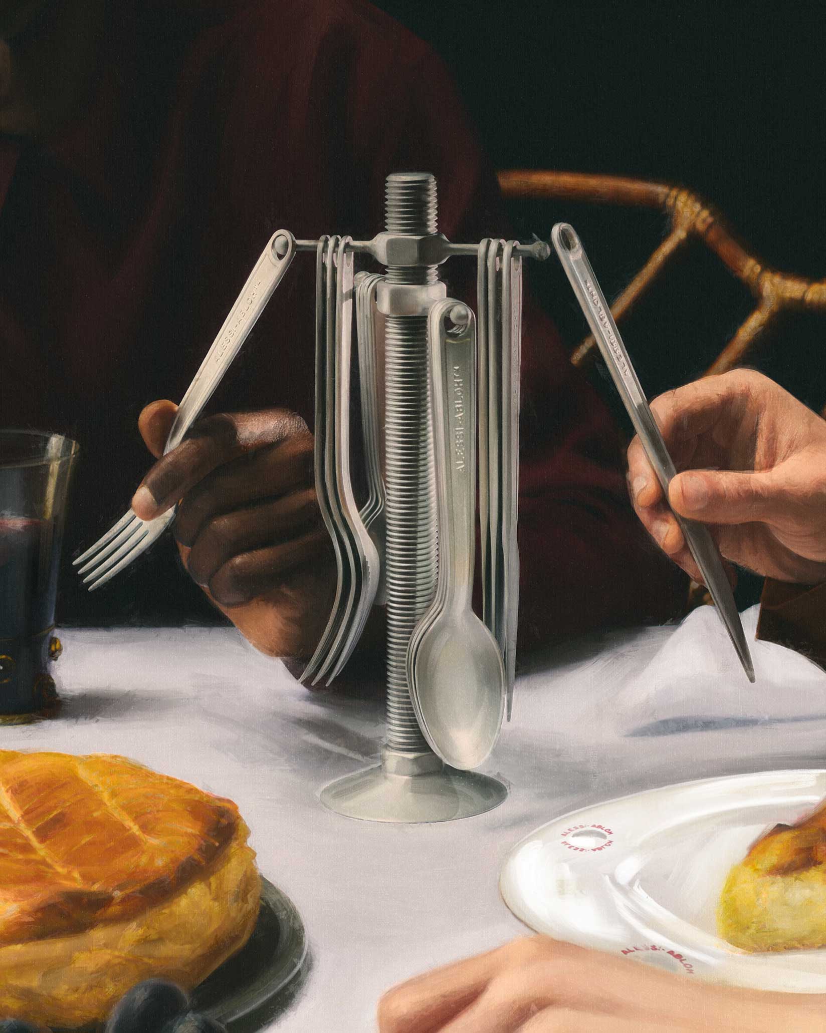 Silver-toned Conversational Objects cutlery set by Alessi, with an industrial stand, forks, spoons, and wrench knives.