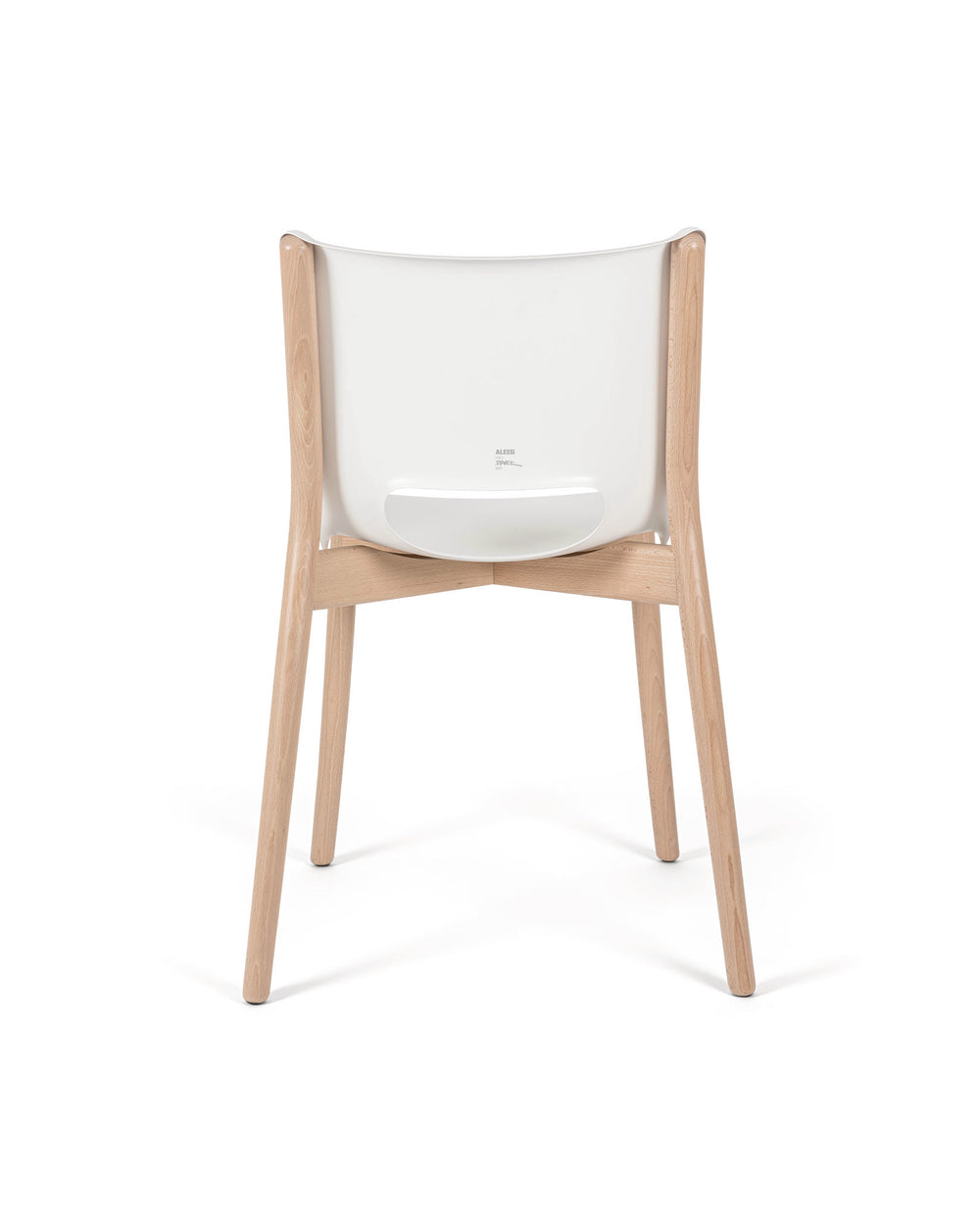 Modern white and wood chair by Alessi, with a curved backrest and visible 'ALESSI STARCK' text, shown from the back.
