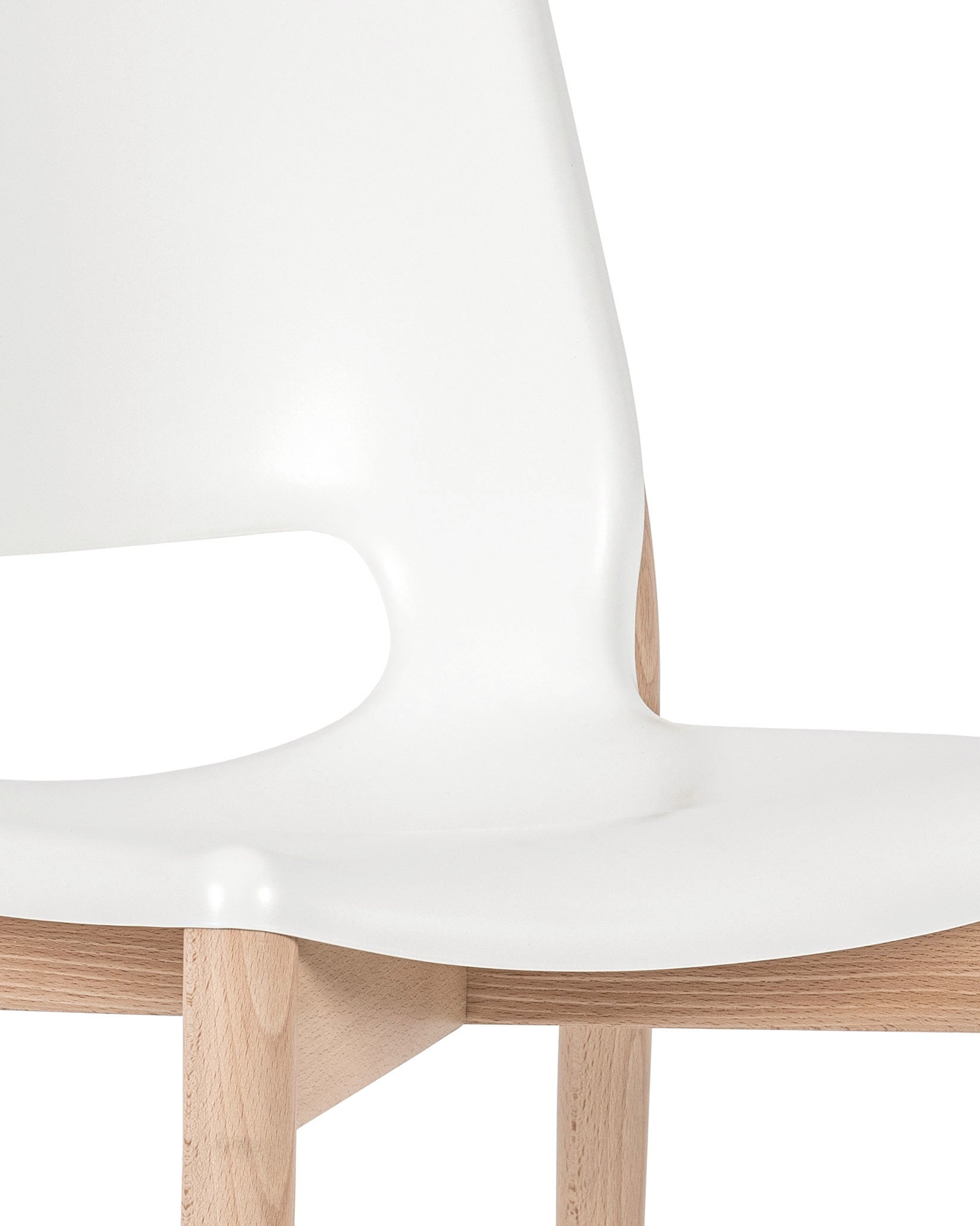 White chair with light wood frame by Alessi, featuring a modern sculptural design, cropped view.